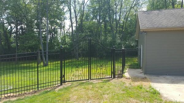 Custom "bourbon st" style wrought Iron gate fabricated for one of our many awesome clients in Chelsea, MI