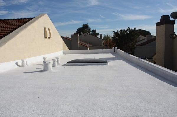 Multi-family roof, San Diego apartment complex receives foam and coating