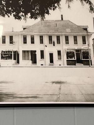 More recent historical photo of building restaurant/bar is in.