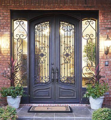 Level up your home with our custom designed double iron doors! Call today to learn more about our different styles and custom options!