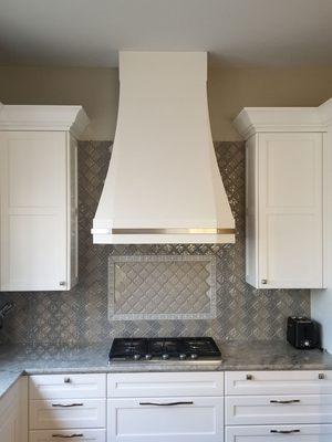 Custom white kitchen hood