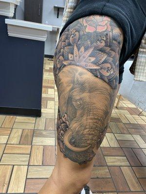 Some of Gabriels mandala work placed behind a healed elephants head he completed a couple of years ago.