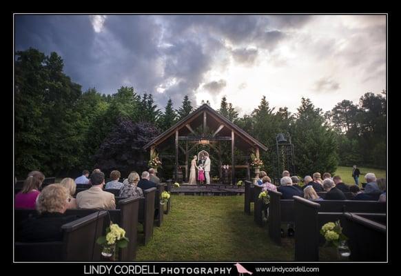 The storm stopped just long enough for this outdoor ceremony at Proctor Farm in Rome, Georgia.