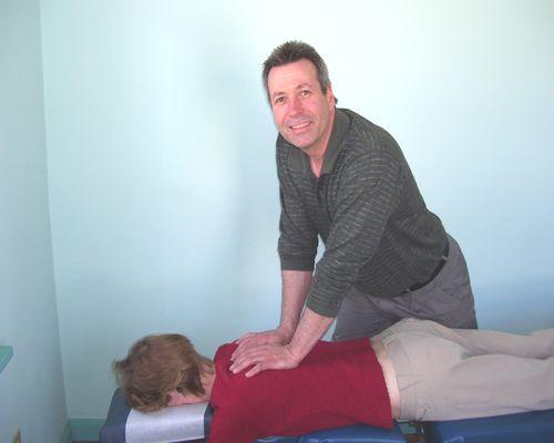 Dr. Rick performing a gentle, effective chiropractic adjustment.