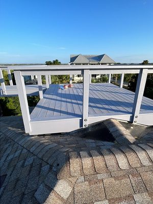 After- New deck and steel cable railings going in