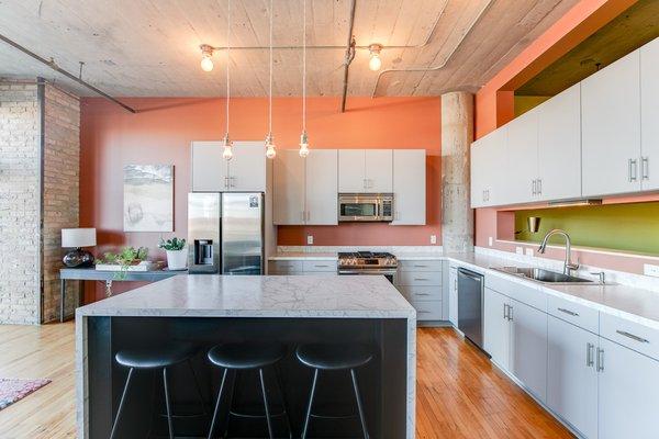 A reface was just what this unique condo/loft kitchen needed to reach its full potential.