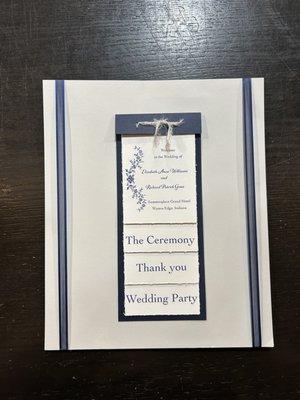 handcrafted navy floral wedding program