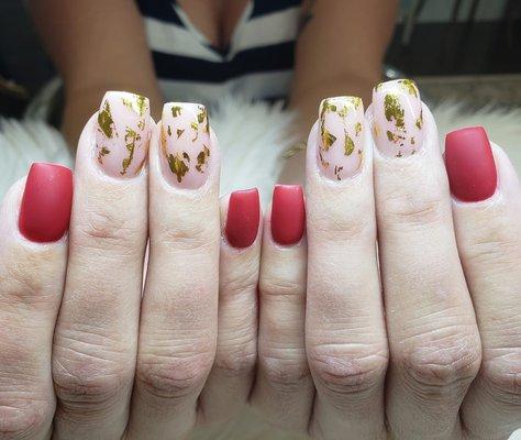 Acrylic nails with matte red and foil.