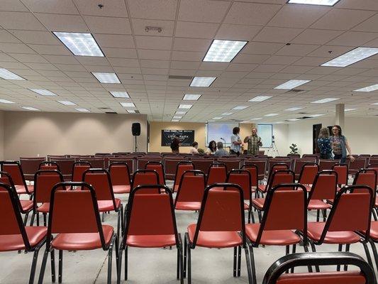 Fellowship time and main church room set up in the new building!