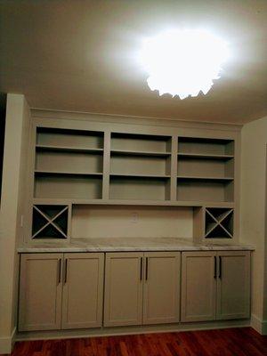 Living room built-in cabinets, shelves and trim installed by James in 2023.