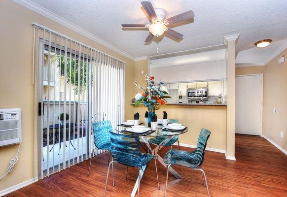 Open floor plans with pass through window from kitchen to dining area.