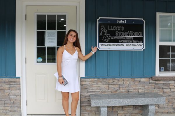 Entrance door with Madison Lloyd the office manager.