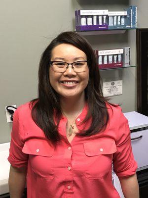 Michelle's smile always makes my day. Oh, and those are Dermalogica products on the wall. They are amazing for your skin.