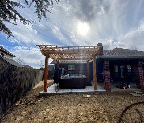 Cedar pergola and concrete pad