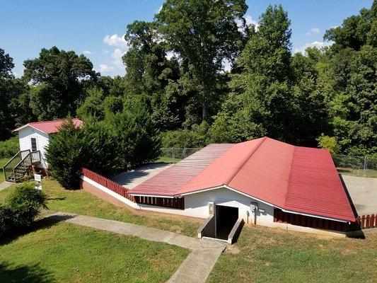 Semi-underground facility provides a more comfortable natural temperature. The kennels are equipped with high velocity fans and A/C as well.