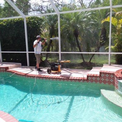 P of Father And Son pressure cleaning my patio and screen enclosure and the red brick on the edge of my pool.
 Very reasonable price.