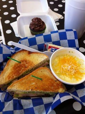 Delicious broccoli cheese soup and grilled turkey pesto sandwich and tea...and today, a free cupcake!