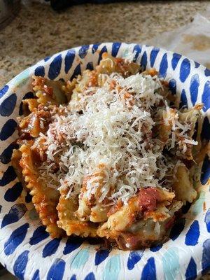 Beef ravioli and meat sauce