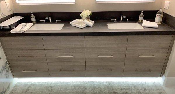 Custom bathroom vanity cabinets with under-mount led light strip