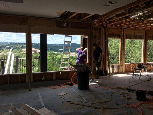 kitchen and living room gutted and custom windows prepared.