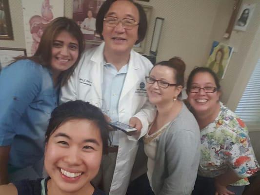 Dr.kim with his staff.