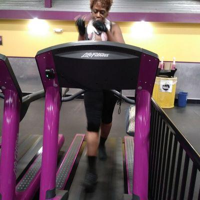 This pic was taken at Planet Fitness, displaying the signature interpretative dance moves on a treadmill.