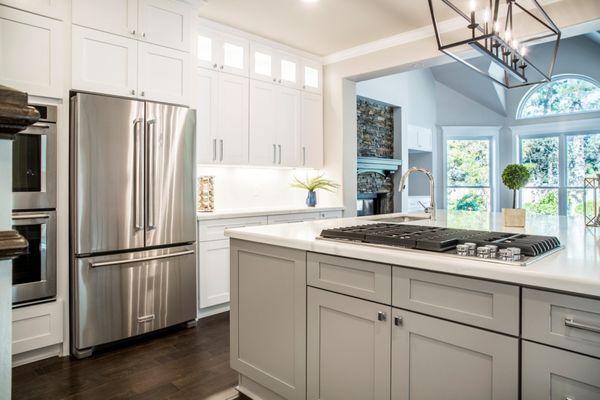 Elegant white shaker cabinets with stacking style