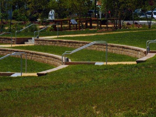 Amphitheater seating located in front of the Half Shell Stage.