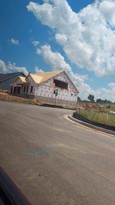 Gable roof with bonus room built into the trusses that were designed, built, and delivered by SBC.