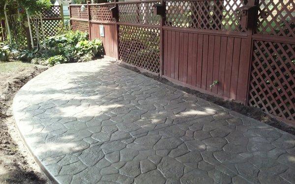 Stamped Patio for a small bench and reading area!!