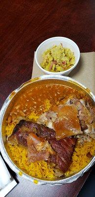 Lots of yumminess! Yellow rice, beans mofungo, pork rinds and pernil! Again I say Yum!