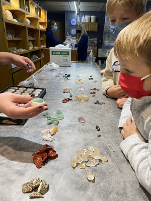 Learning about how their rough finds become wearable jewels.