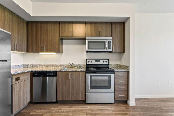 Updated kitchen with modern stainless steel appliances