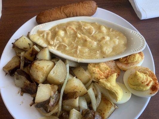 Chicken-n-dumplings, potatoes & onions, deviled eggs and a soft bread stick. Good meal!