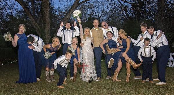 Fun wedding party photo at night