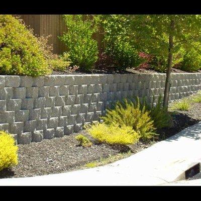 ABRAMS BUILT Retaining Walls, Pavers, and Turf