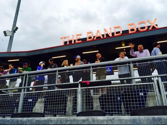 Bar and standing area overlooking the ball field