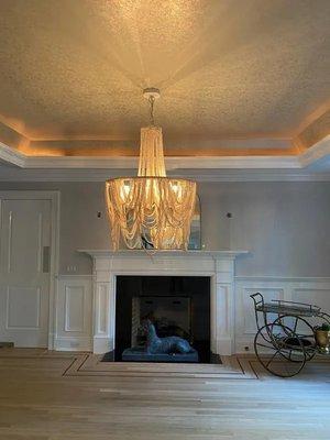 A gorgeous chandelier hung.  So elegant!