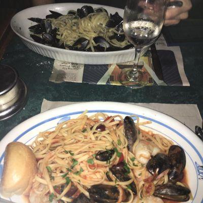 This is clams mussels and scallops over pasta.