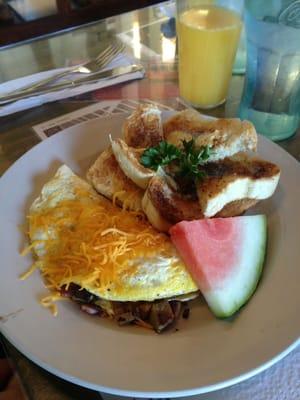 1/2 pig pickin omelet with fresh watermelon & homemade white toast.