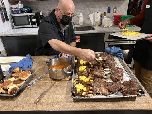 Chef Mike glazing the ribs