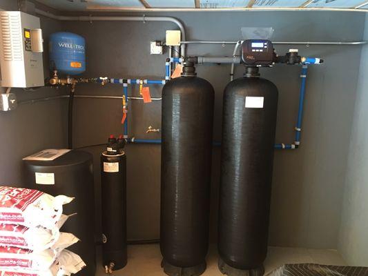 4 cu. Ft. twin water softeners with high capacity sediment filter for irrigation water on large estate to remove iron, sediment.