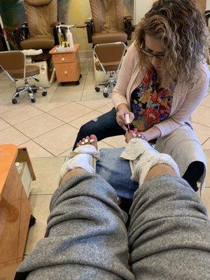 Jenny doing my pedicure. Really loved the hot towel! Basic $22