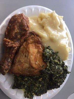 Fried chicken creamed spinach and mashed potatoes and gravy