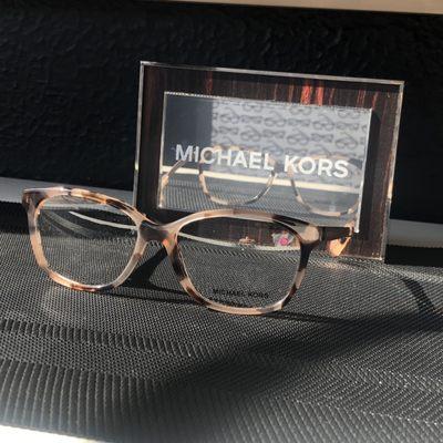 Oxie Affordable Optical carries a variety of designer frames, including Michael Kors