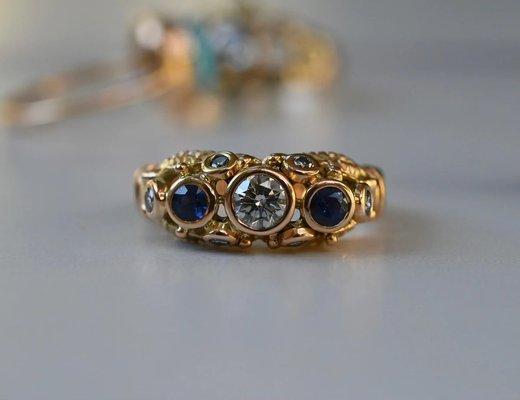 Diamond and blue sapphires set in 14k yellow gold