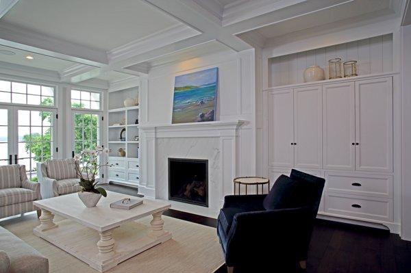 Painted fireplace cabinetry with ceiling grid work