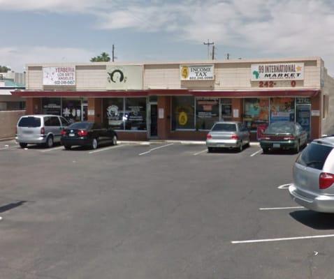 Front of business  Sign above says "Royale Cuts Barber Shop"