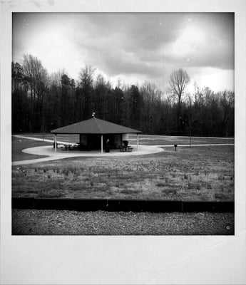 Sit, eat, relax. Trails in background woods.