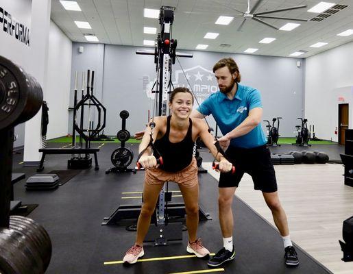 Young female strength training.